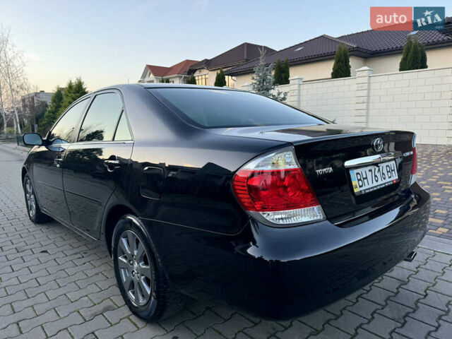 Черный Тойота Камри, объемом двигателя 2.36 л и пробегом 98 тыс. км за 8700 $, фото 15 на Automoto.ua