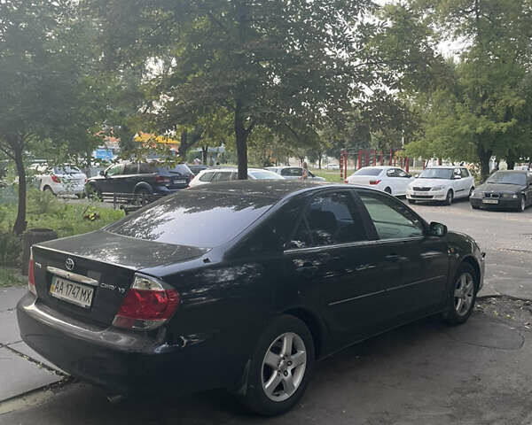 Чорний Тойота Камрі, об'ємом двигуна 3 л та пробігом 409 тис. км за 6000 $, фото 5 на Automoto.ua
