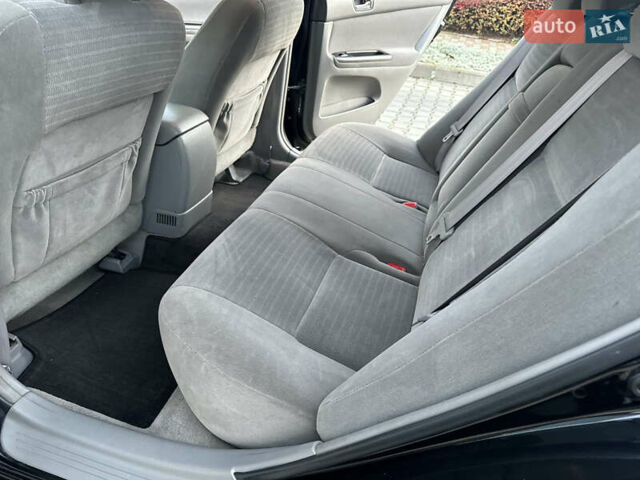 Черный Тойота Камри, объемом двигателя 2.36 л и пробегом 98 тыс. км за 8700 $, фото 59 на Automoto.ua