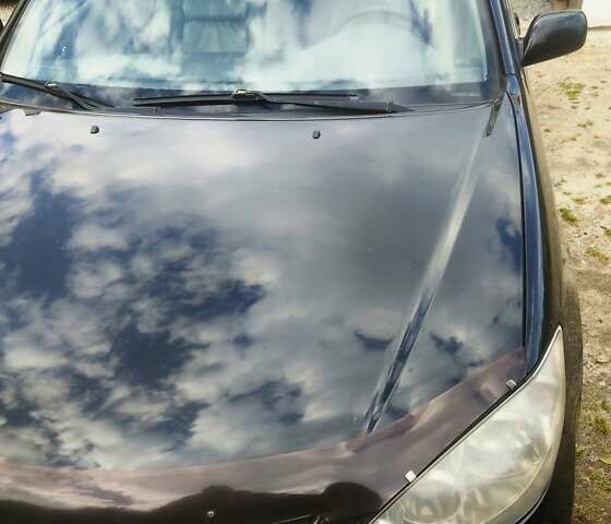 Чорний Тойота Камрі, об'ємом двигуна 3 л та пробігом 208 тис. км за 6700 $, фото 35 на Automoto.ua