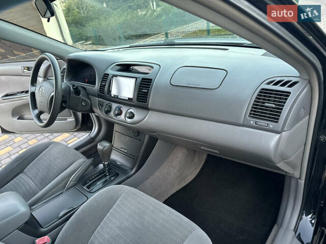 Черный Тойота Камри, объемом двигателя 2.36 л и пробегом 98 тыс. км за 8700 $, фото 80 на Automoto.ua