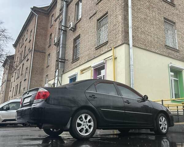 Черный Тойота Камри, объемом двигателя 3 л и пробегом 315 тыс. км за 5700 $, фото 7 на Automoto.ua
