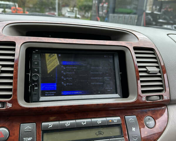 Чорний Тойота Камрі, об'ємом двигуна 2.4 л та пробігом 292 тис. км за 5350 $, фото 18 на Automoto.ua