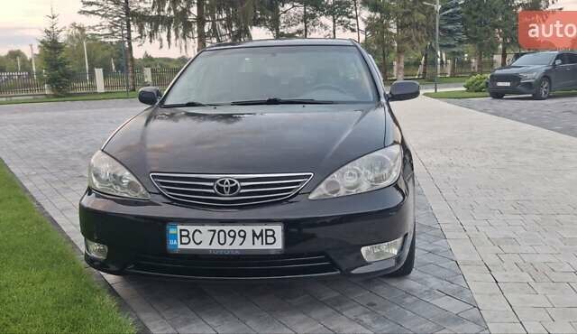 Чорний Тойота Камрі, об'ємом двигуна 2.36 л та пробігом 335 тис. км за 5000 $, фото 9 на Automoto.ua