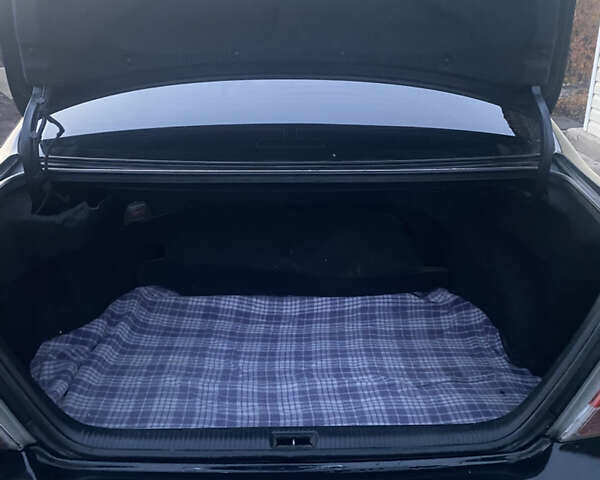 Черный Тойота Камри, объемом двигателя 2.36 л и пробегом 360 тыс. км за 7500 $, фото 13 на Automoto.ua