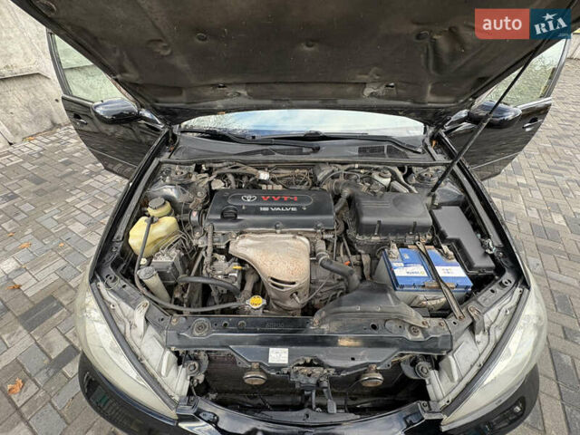 Черный Тойота Камри, объемом двигателя 2.4 л и пробегом 326 тыс. км за 6300 $, фото 30 на Automoto.ua