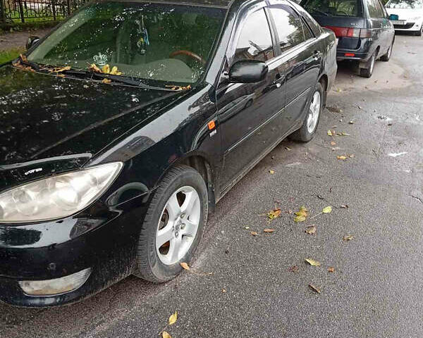 Черный Тойота Камри, объемом двигателя 2.36 л и пробегом 350 тыс. км за 4500 $, фото 4 на Automoto.ua