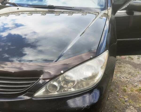 Чорний Тойота Камрі, об'ємом двигуна 3 л та пробігом 208 тис. км за 6700 $, фото 24 на Automoto.ua