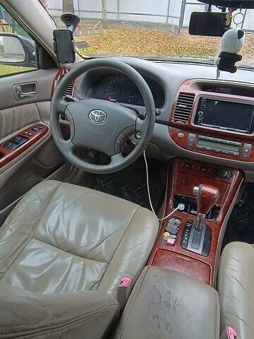 Чорний Тойота Камрі, об'ємом двигуна 2.4 л та пробігом 300 тис. км за 5500 $, фото 11 на Automoto.ua