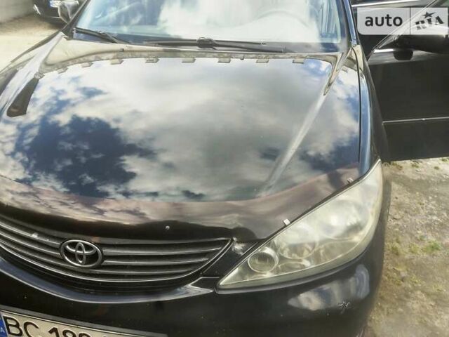 Чорний Тойота Камрі, об'ємом двигуна 3 л та пробігом 208 тис. км за 6700 $, фото 25 на Automoto.ua