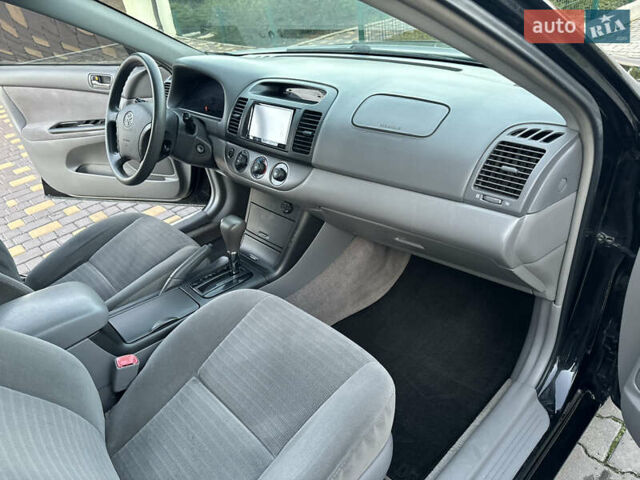 Черный Тойота Камри, объемом двигателя 2.36 л и пробегом 98 тыс. км за 8700 $, фото 71 на Automoto.ua
