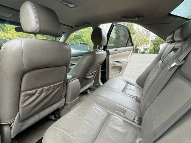 Черный Тойота Камри, объемом двигателя 2.4 л и пробегом 180 тыс. км за 6000 $, фото 11 на Automoto.ua