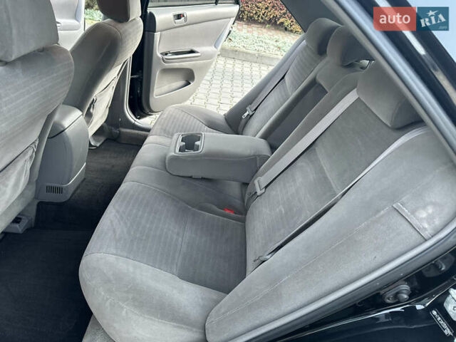 Черный Тойота Камри, объемом двигателя 2.36 л и пробегом 98 тыс. км за 8700 $, фото 61 на Automoto.ua