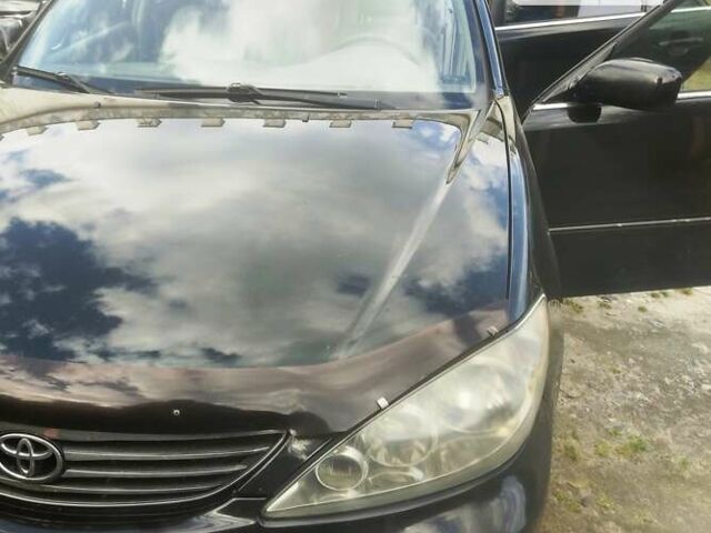 Чорний Тойота Камрі, об'ємом двигуна 3 л та пробігом 208 тис. км за 6700 $, фото 26 на Automoto.ua