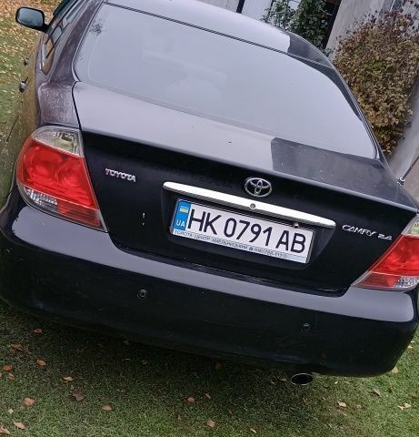 Черный Тойота Камри, объемом двигателя 2.4 л и пробегом 300 тыс. км за 5500 $, фото 9 на Automoto.ua
