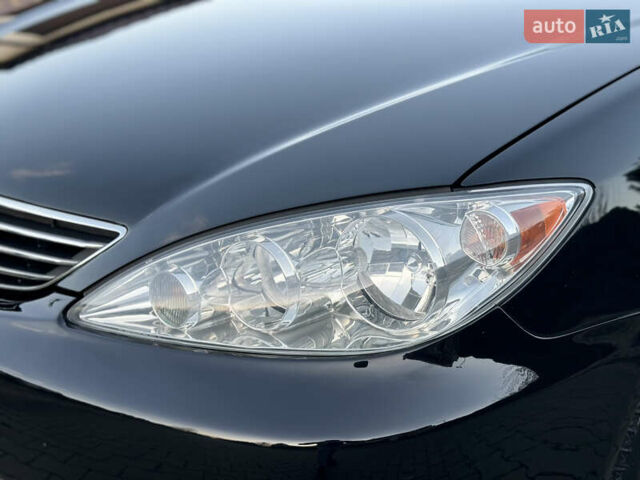 Черный Тойота Камри, объемом двигателя 2.36 л и пробегом 98 тыс. км за 8700 $, фото 3 на Automoto.ua