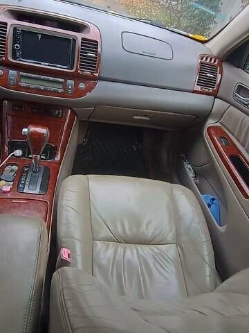 Чорний Тойота Камрі, об'ємом двигуна 2.4 л та пробігом 300 тис. км за 5500 $, фото 12 на Automoto.ua