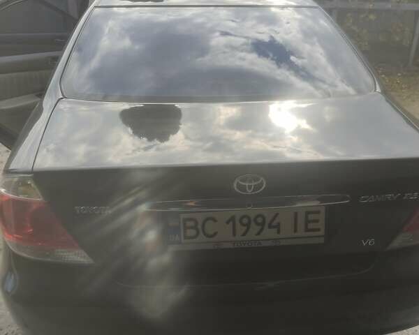 Чорний Тойота Камрі, об'ємом двигуна 3 л та пробігом 208 тис. км за 6700 $, фото 28 на Automoto.ua