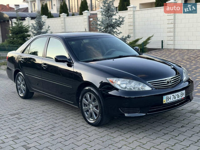 Черный Тойота Камри, объемом двигателя 2.36 л и пробегом 98 тыс. км за 8700 $, фото 27 на Automoto.ua