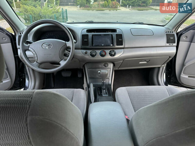 Черный Тойота Камри, объемом двигателя 2.36 л и пробегом 98 тыс. км за 8700 $, фото 65 на Automoto.ua