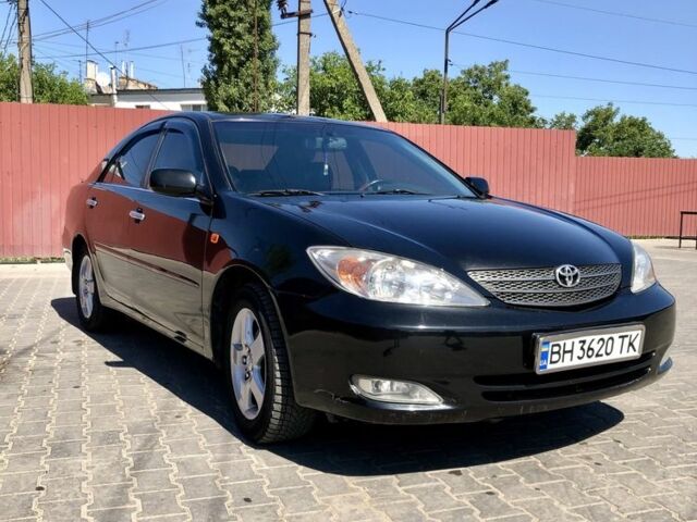 Черный Тойота Камри, объемом двигателя 2.4 л и пробегом 310 тыс. км за 5000 $, фото 5 на Automoto.ua