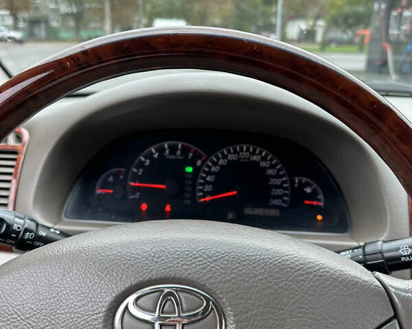 Чорний Тойота Камрі, об'ємом двигуна 2.4 л та пробігом 292 тис. км за 5350 $, фото 19 на Automoto.ua