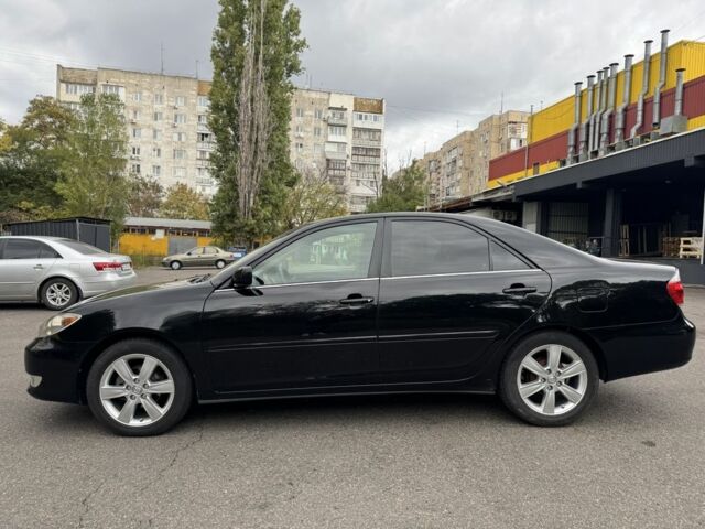 Черный Тойота Камри, объемом двигателя 2.4 л и пробегом 180 тыс. км за 6000 $, фото 4 на Automoto.ua