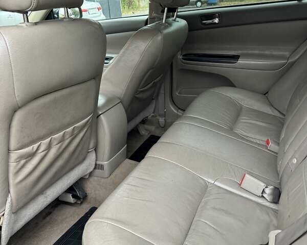 Чорний Тойота Камрі, об'ємом двигуна 2.36 л та пробігом 180 тис. км за 6000 $, фото 10 на Automoto.ua