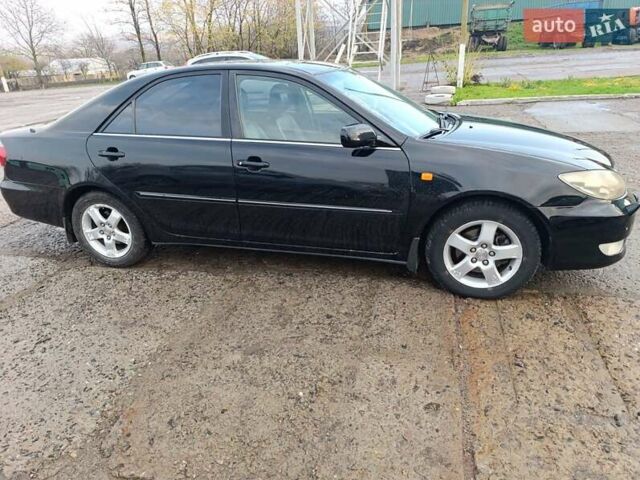 Черный Тойота Камри, объемом двигателя 3 л и пробегом 210 тыс. км за 7200 $, фото 5 на Automoto.ua