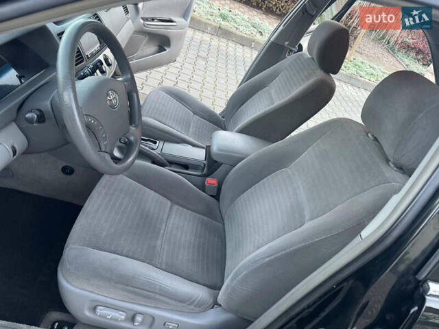 Черный Тойота Камри, объемом двигателя 2.36 л и пробегом 98 тыс. км за 8700 $, фото 45 на Automoto.ua