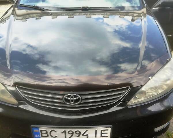 Чорний Тойота Камрі, об'ємом двигуна 3 л та пробігом 208 тис. км за 6700 $, фото 20 на Automoto.ua