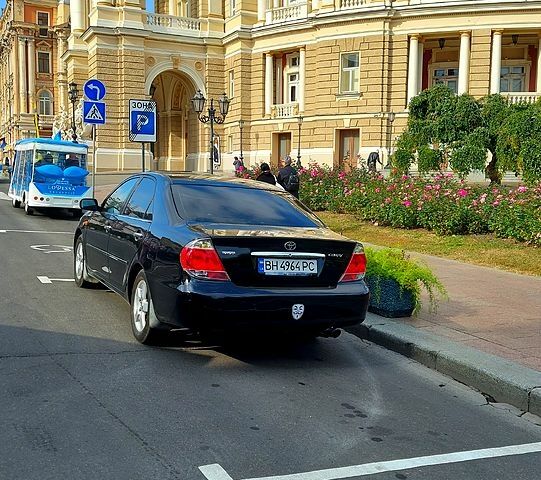 Черный Тойота Камри, объемом двигателя 3 л и пробегом 242 тыс. км за 6200 $, фото 3 на Automoto.ua