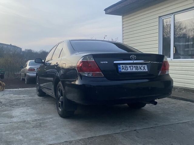 Черный Тойота Камри, объемом двигателя 2.4 л и пробегом 300 тыс. км за 7500 $, фото 3 на Automoto.ua