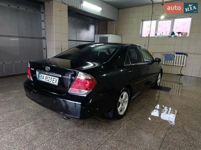 Черный Тойота Камри, объемом двигателя 3 л и пробегом 210 тыс. км за 7200 $, фото 2 на Automoto.ua