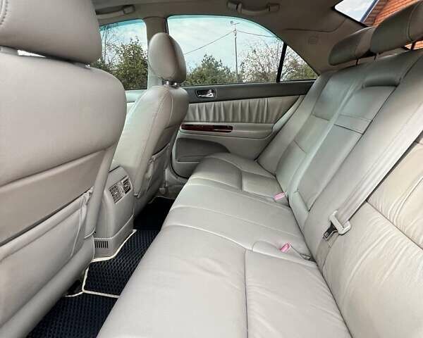 Черный Тойота Камри, объемом двигателя 2.36 л и пробегом 167 тыс. км за 7900 $, фото 7 на Automoto.ua