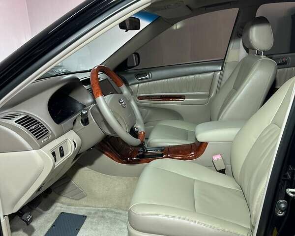Черный Тойота Камри, объемом двигателя 2.36 л и пробегом 253 тыс. км за 6900 $, фото 36 на Automoto.ua