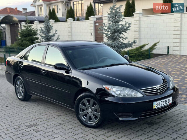 Черный Тойота Камри, объемом двигателя 2.36 л и пробегом 98 тыс. км за 8700 $, фото 30 на Automoto.ua