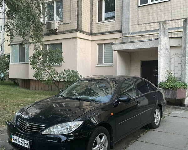 Чорний Тойота Камрі, об'ємом двигуна 3 л та пробігом 409 тис. км за 6000 $, фото 1 на Automoto.ua