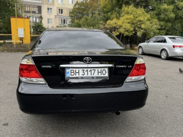 Черный Тойота Камри, объемом двигателя 2.4 л и пробегом 180 тыс. км за 6000 $, фото 6 на Automoto.ua