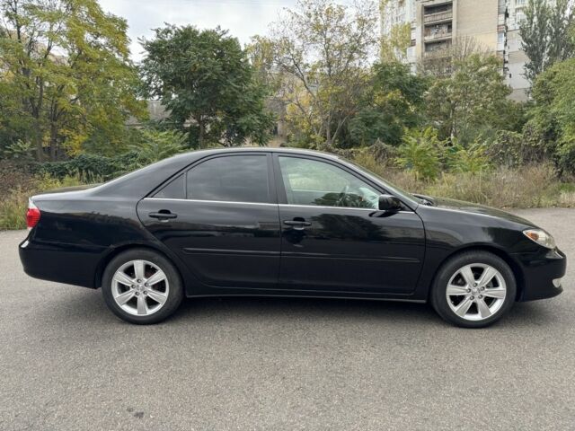 Черный Тойота Камри, объемом двигателя 2.4 л и пробегом 180 тыс. км за 6000 $, фото 5 на Automoto.ua