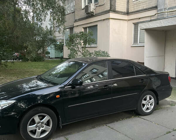 Чорний Тойота Камрі, об'ємом двигуна 3 л та пробігом 409 тис. км за 6000 $, фото 2 на Automoto.ua