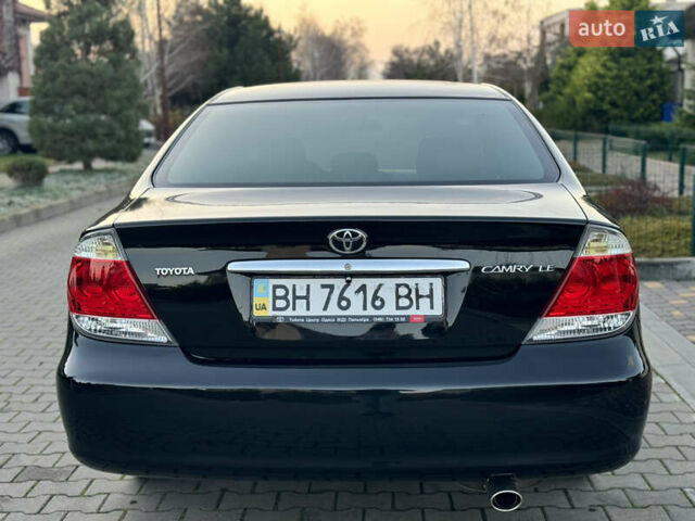 Черный Тойота Камри, объемом двигателя 2.36 л и пробегом 98 тыс. км за 8700 $, фото 20 на Automoto.ua