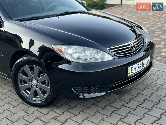 Черный Тойота Камри, объемом двигателя 2.36 л и пробегом 98 тыс. км за 8700 $, фото 34 на Automoto.ua