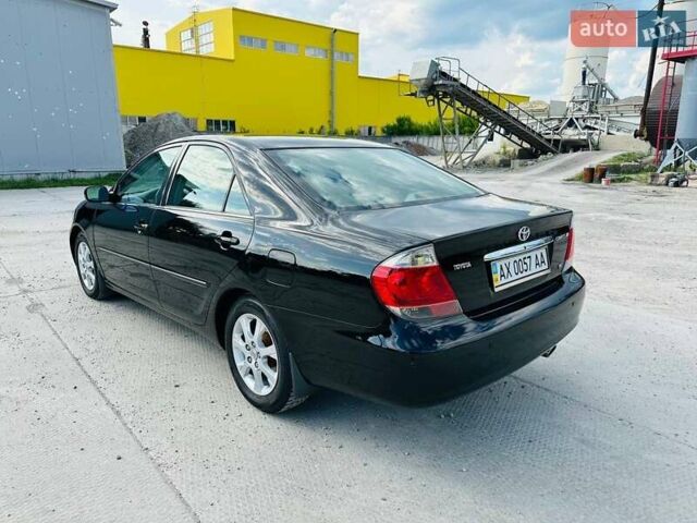 Черный Тойота Камри, объемом двигателя 3 л и пробегом 195 тыс. км за 6900 $, фото 2 на Automoto.ua