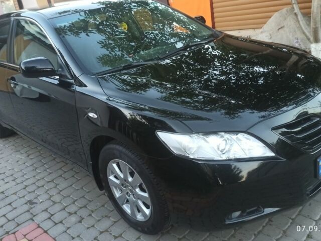 Черный Тойота Камри, объемом двигателя 2.4 л и пробегом 236 тыс. км за 7800 $, фото 1 на Automoto.ua