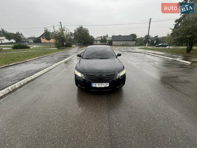 Черный Тойота Камри, объемом двигателя 3.46 л и пробегом 320 тыс. км за 6900 $, фото 1 на Automoto.ua