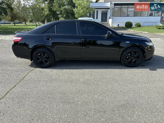 Черный Тойота Камри, объемом двигателя 3.46 л и пробегом 320 тыс. км за 6350 $, фото 4 на Automoto.ua