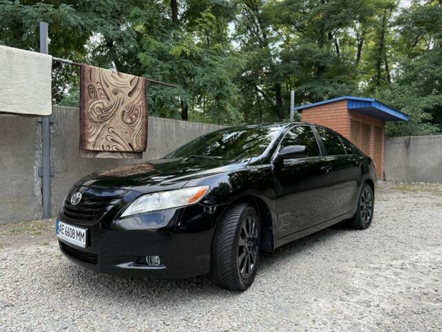 Черный Тойота Камри, объемом двигателя 2.4 л и пробегом 300 тыс. км за 7600 $, фото 1 на Automoto.ua