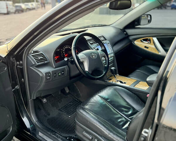 Черный Тойота Камри, объемом двигателя 2.4 л и пробегом 235 тыс. км за 7499 $, фото 34 на Automoto.ua
