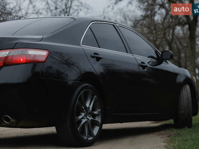 Черный Тойота Камри, объемом двигателя 3.46 л и пробегом 316 тыс. км за 9500 $, фото 45 на Automoto.ua